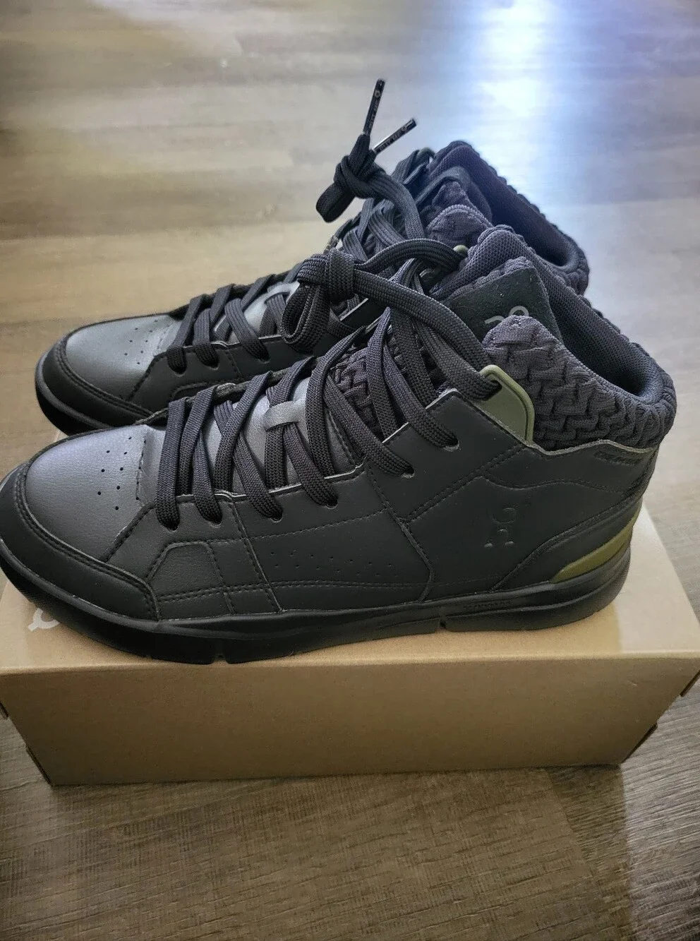 On Running Black High-Top Athletic Shoes with Olive Accents